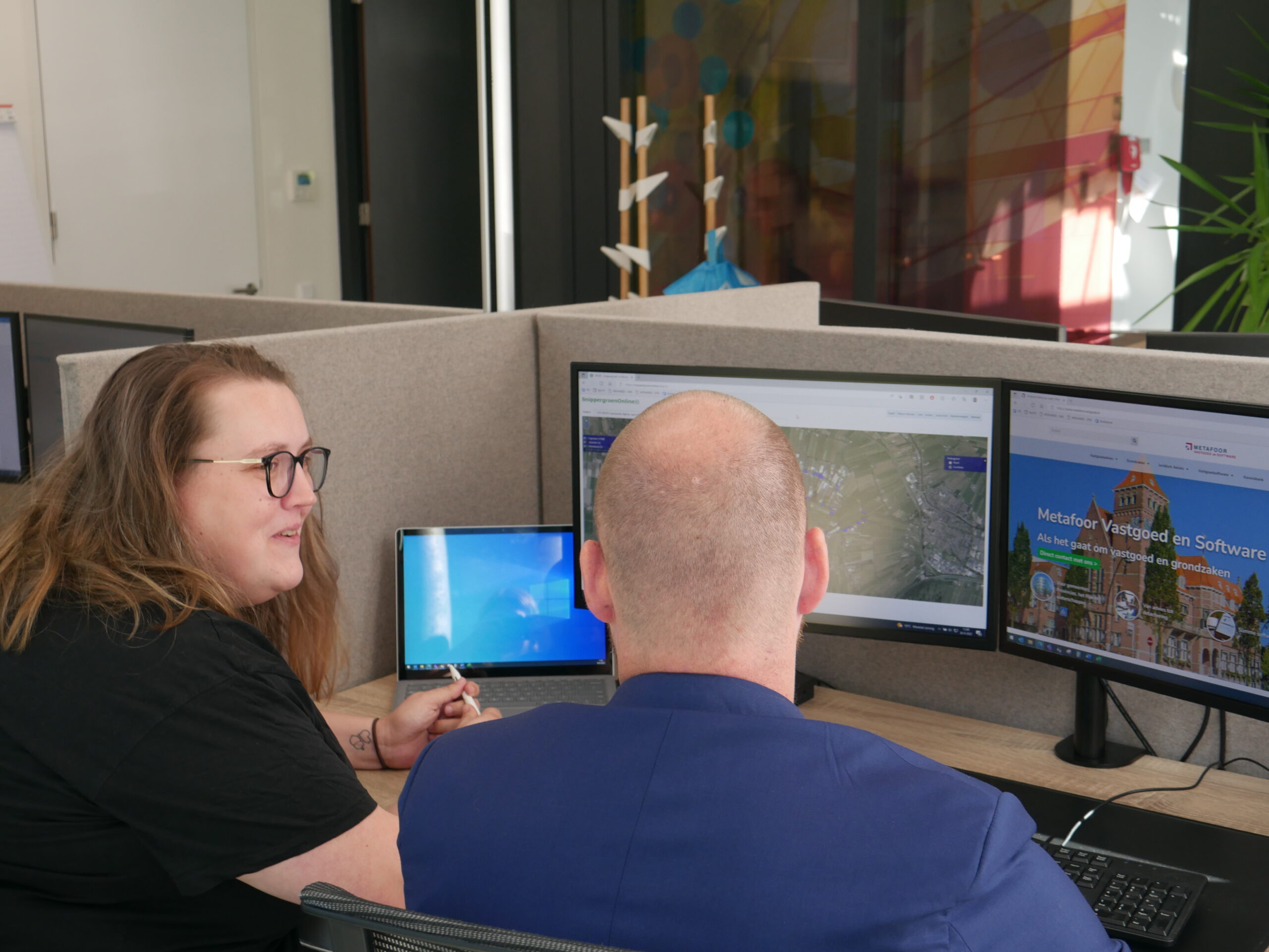 Collega's van Metafoor Software bekijken software voor vastgoed en grondzaken